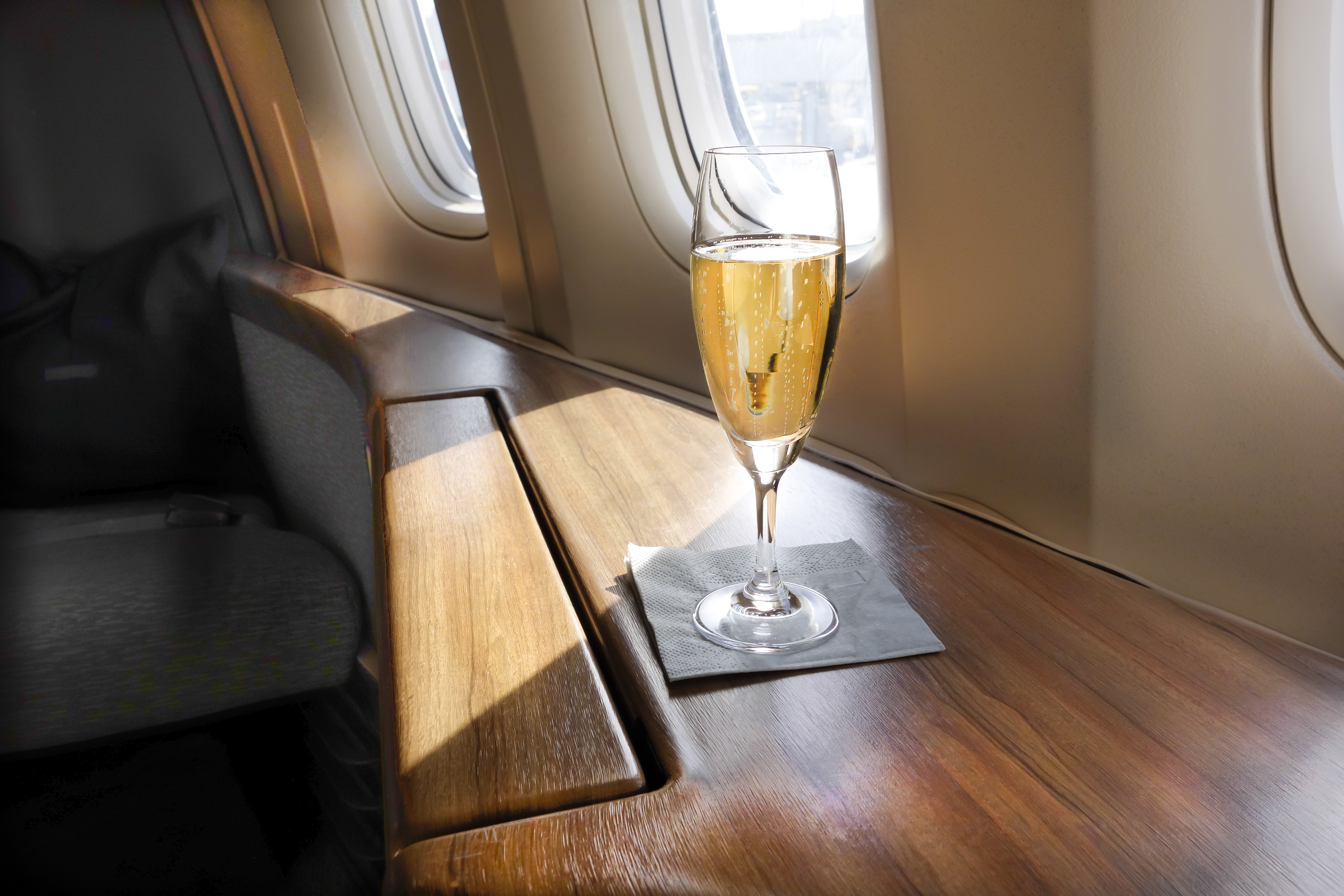 first class glass of champagne