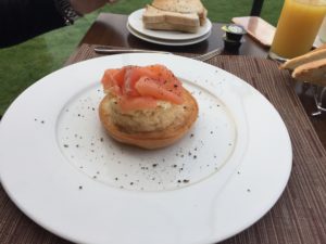 scrambled egg and salmon bagel