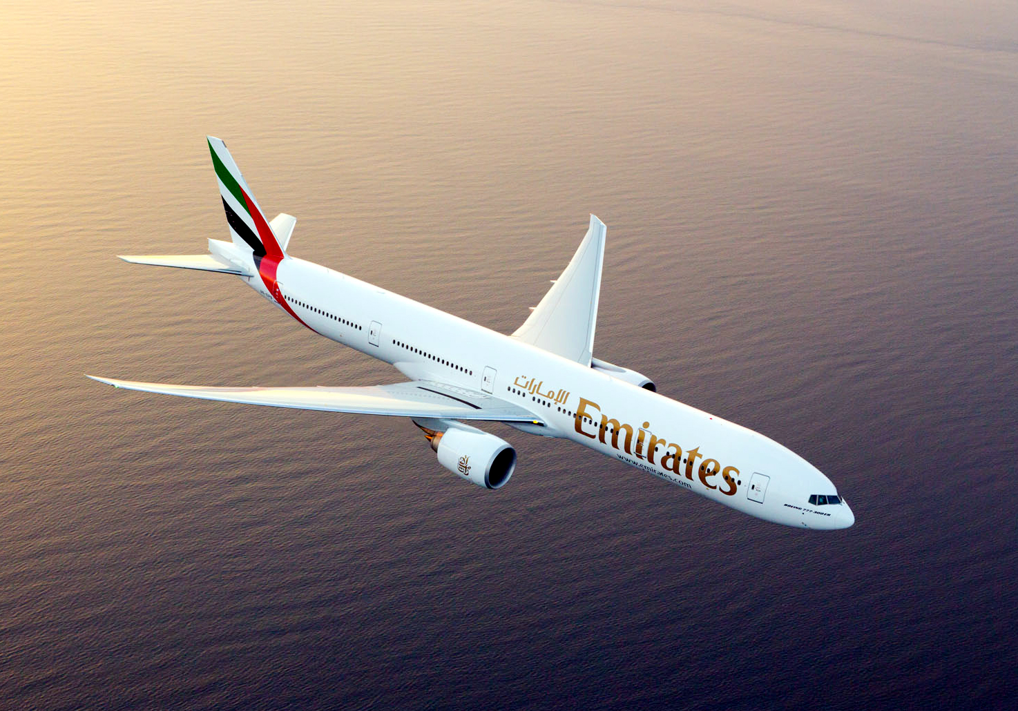 Emirates Boeing 777-300ER photographed on August 17, 2015 from Wolfe Air Aviation's Lear 25B.