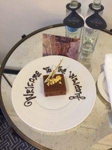 Welcome cake and awaiting water at the Waldorf Hilton London