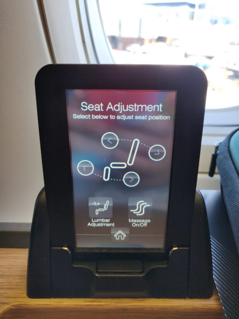 AA International First review seat controls