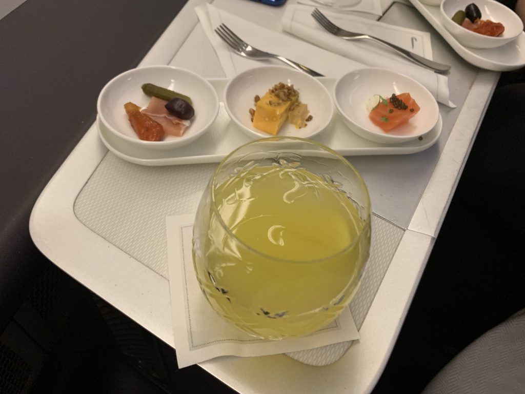 A Gin Zing cocktail and the canapes 