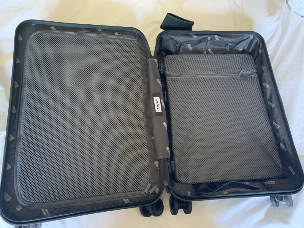 Away bag best sale vs tumi