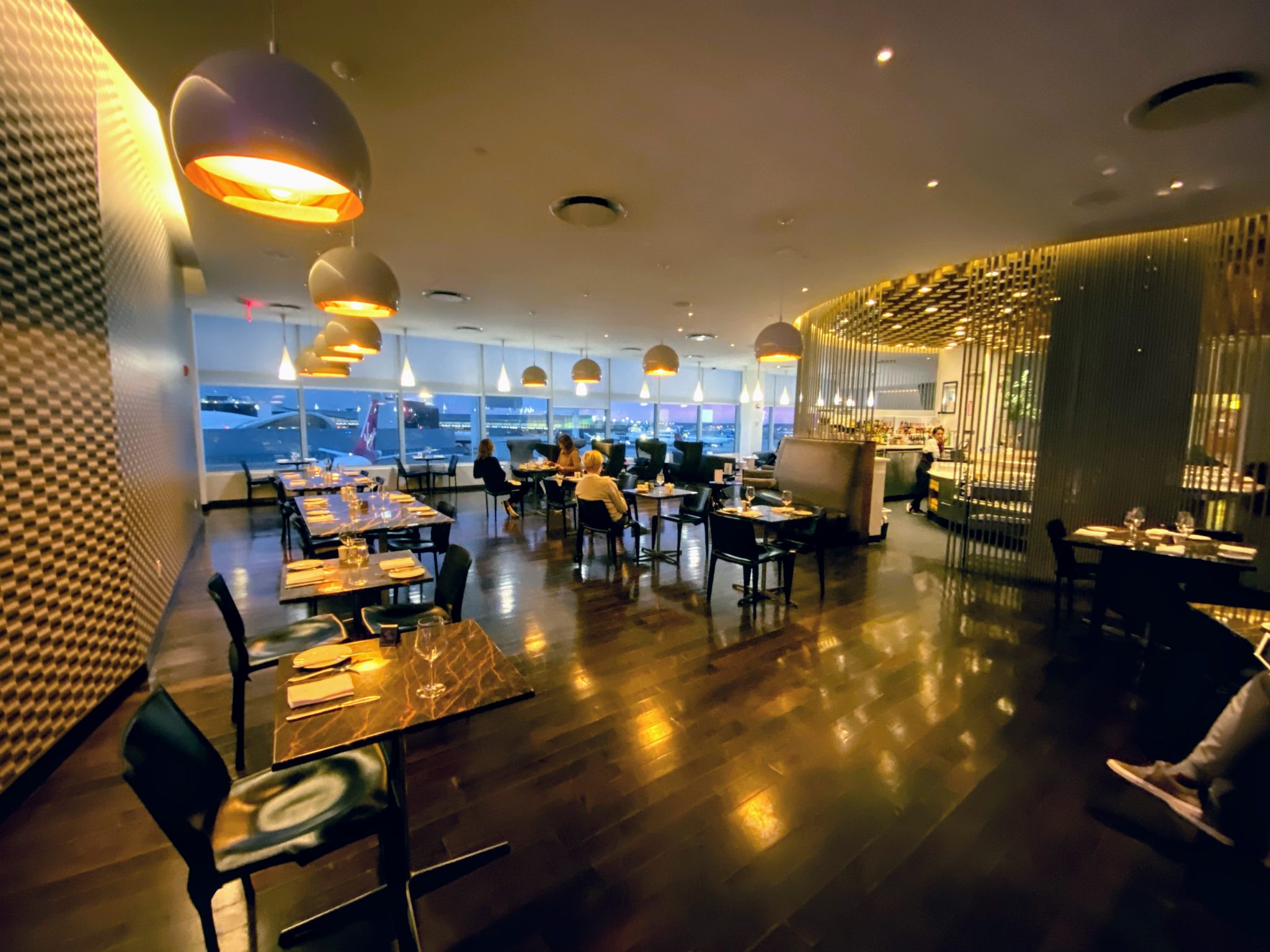Dining area with bar to right