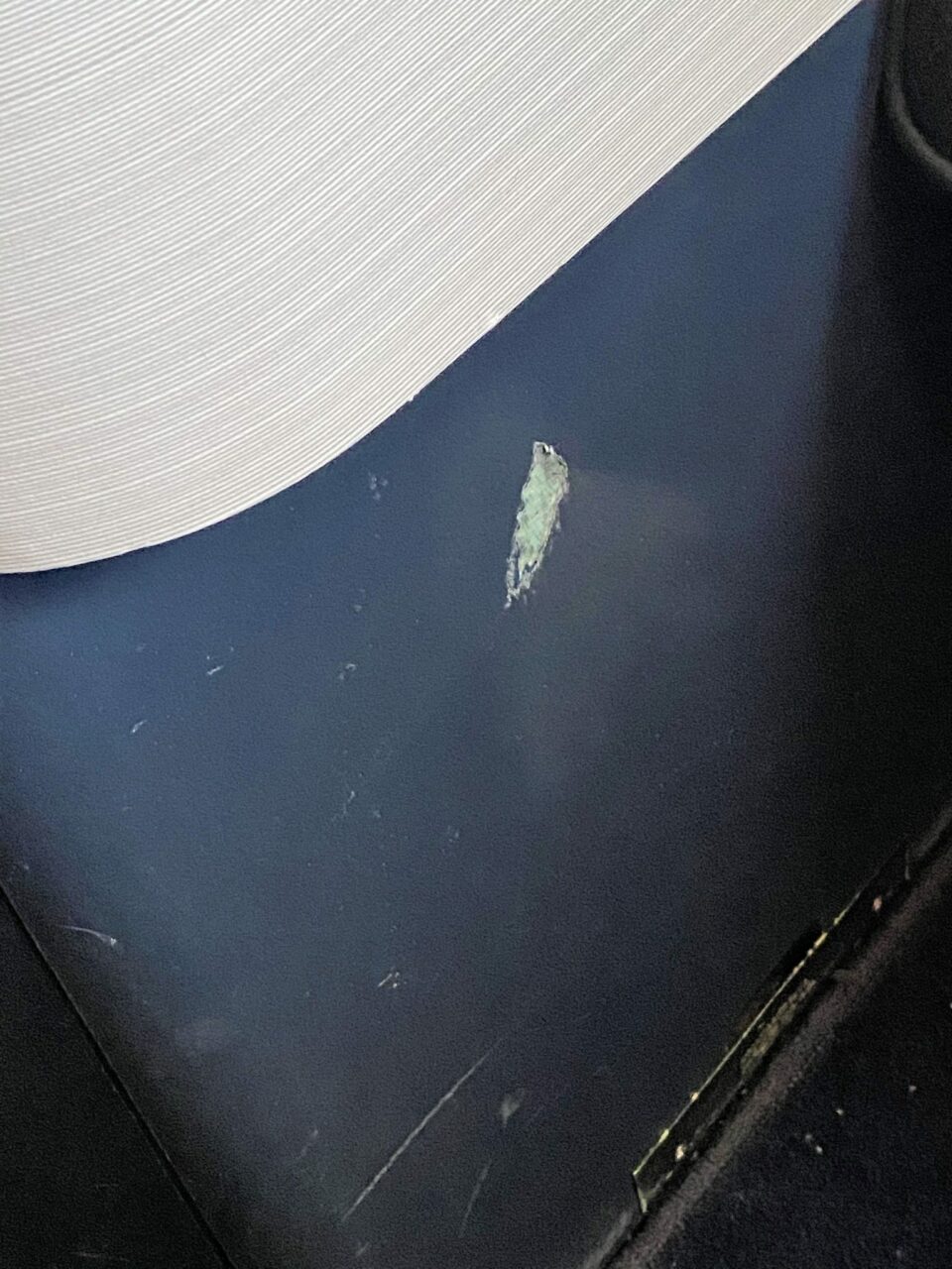 Scuffed seat at British Airways First B777-200 cabin