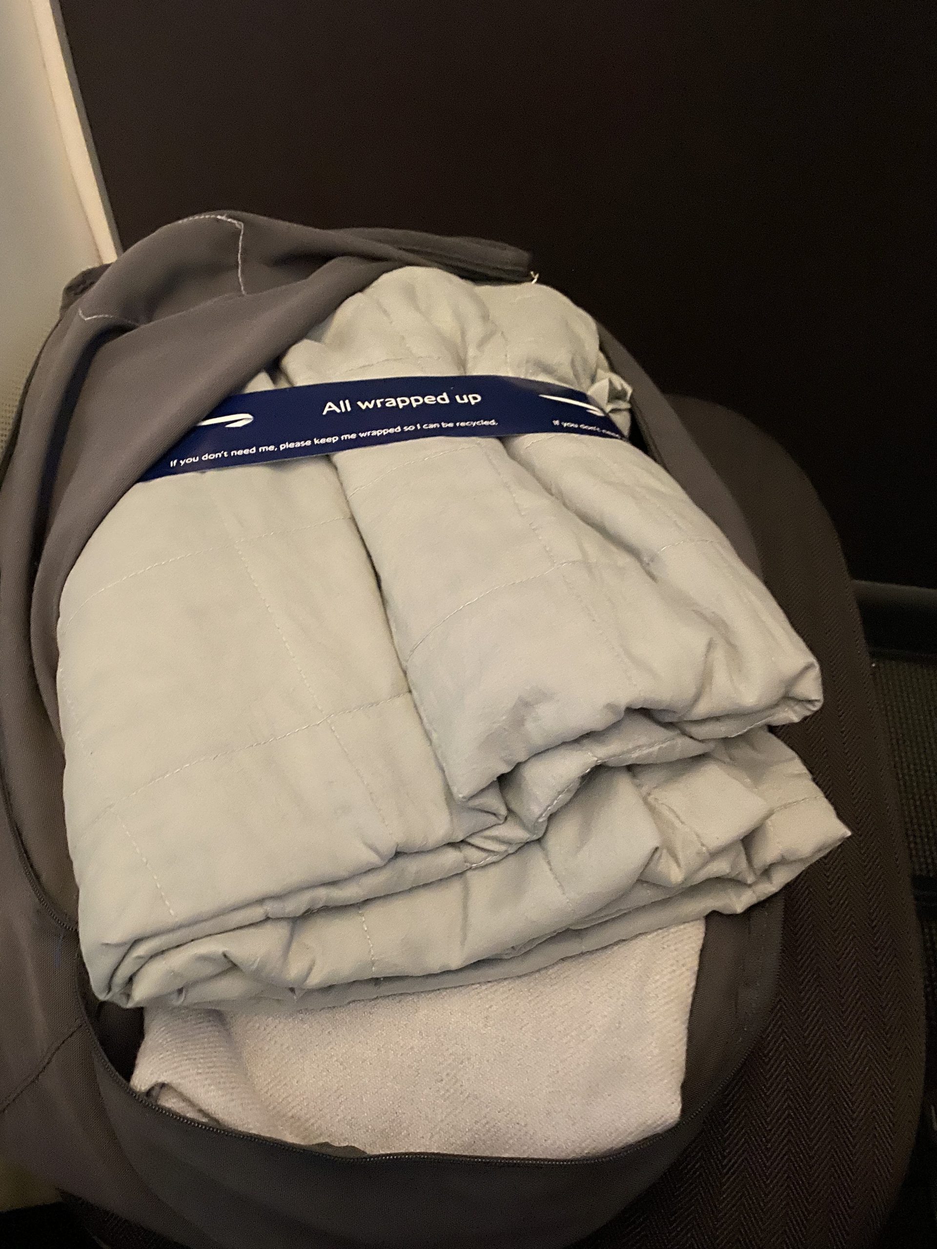 Club World White Company bedding with the day blanket at the top