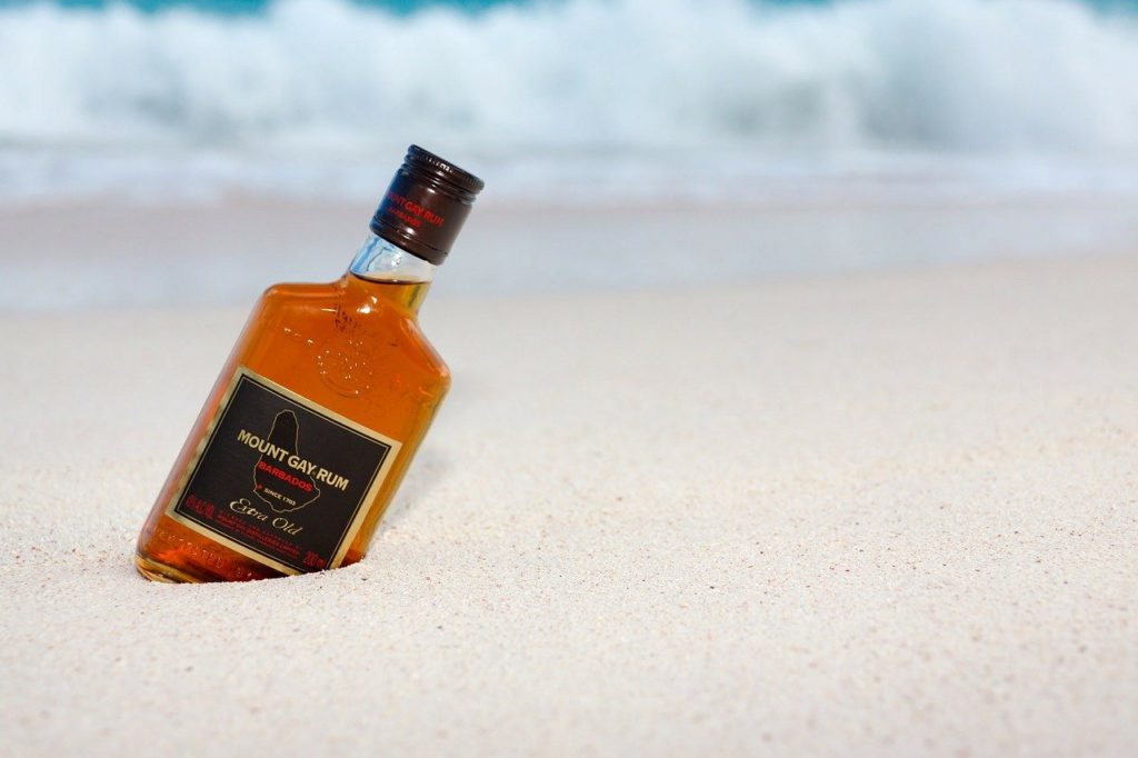 Mount Gray Rum distilled in Barbados on a beach. 