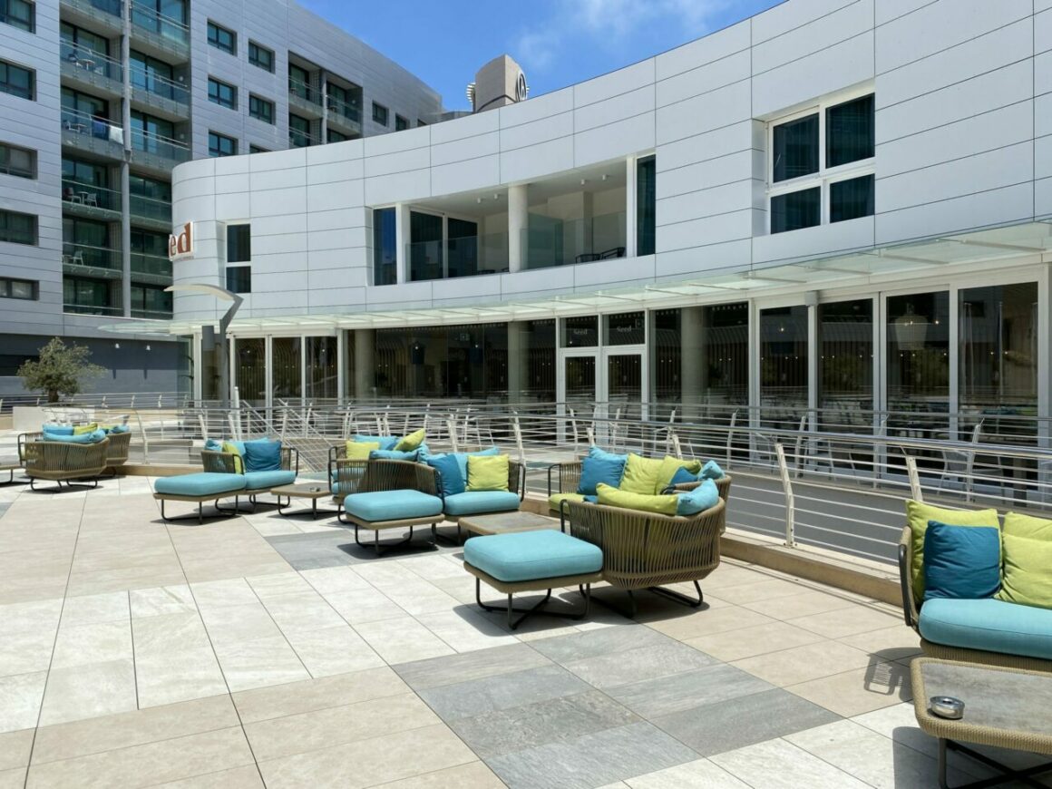 Outdoor bar and dining area in Hyatt Regency Malta