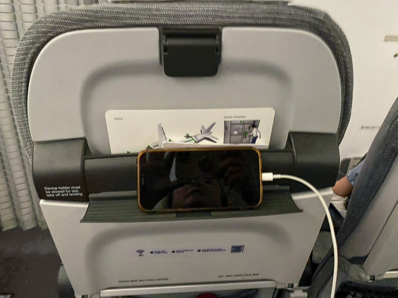 Finnair wet lease Club Europe seat with small shelf 