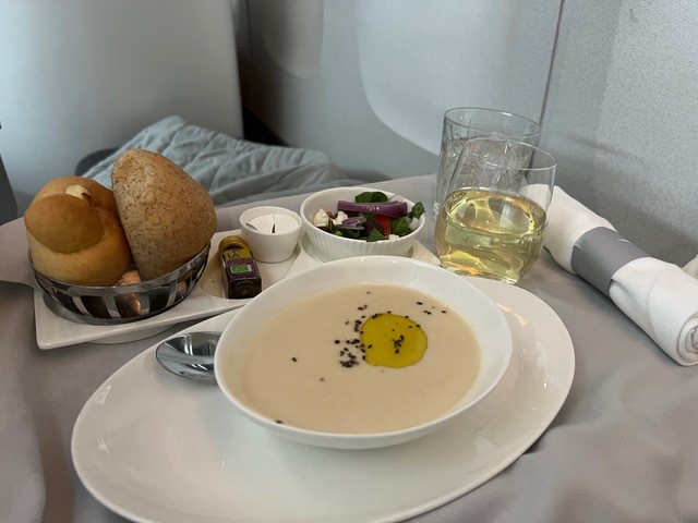 New Club World food flight soup with two bread rolls 