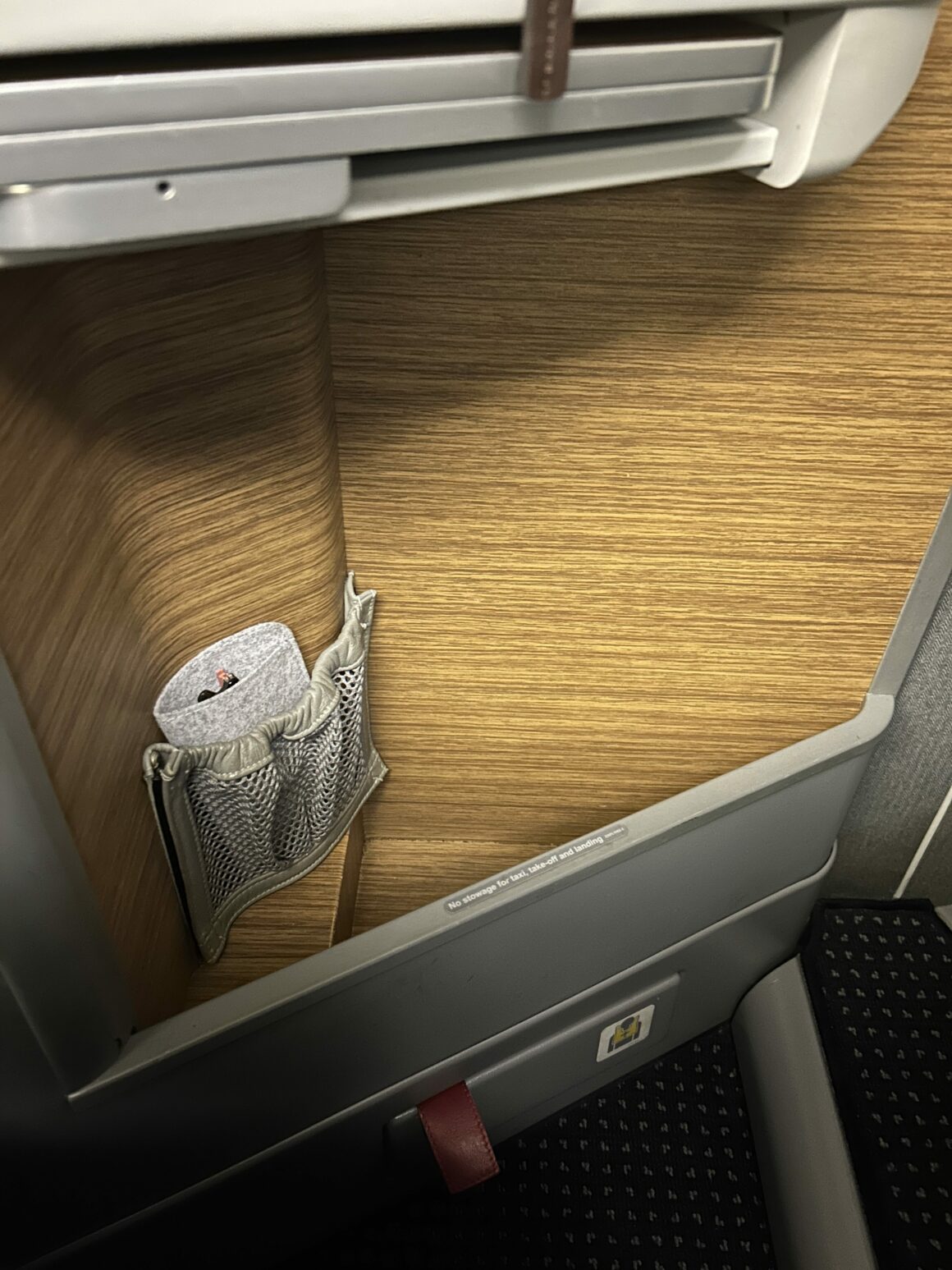 American Airlines B777-300ER Business Class storage in the seat 