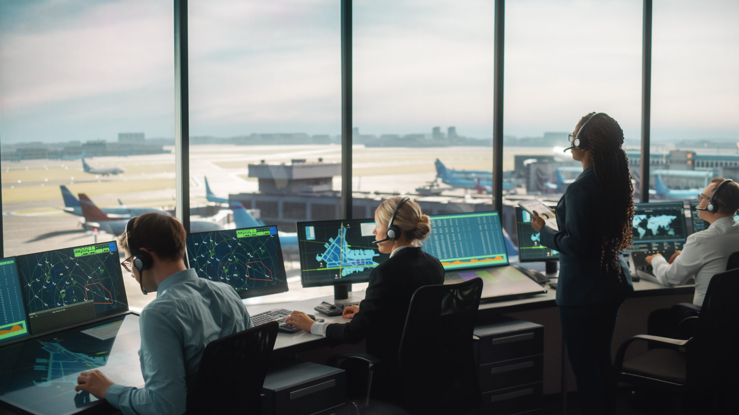 Diverse Air Traffic Control Team Working in a Modern Airport Tow
