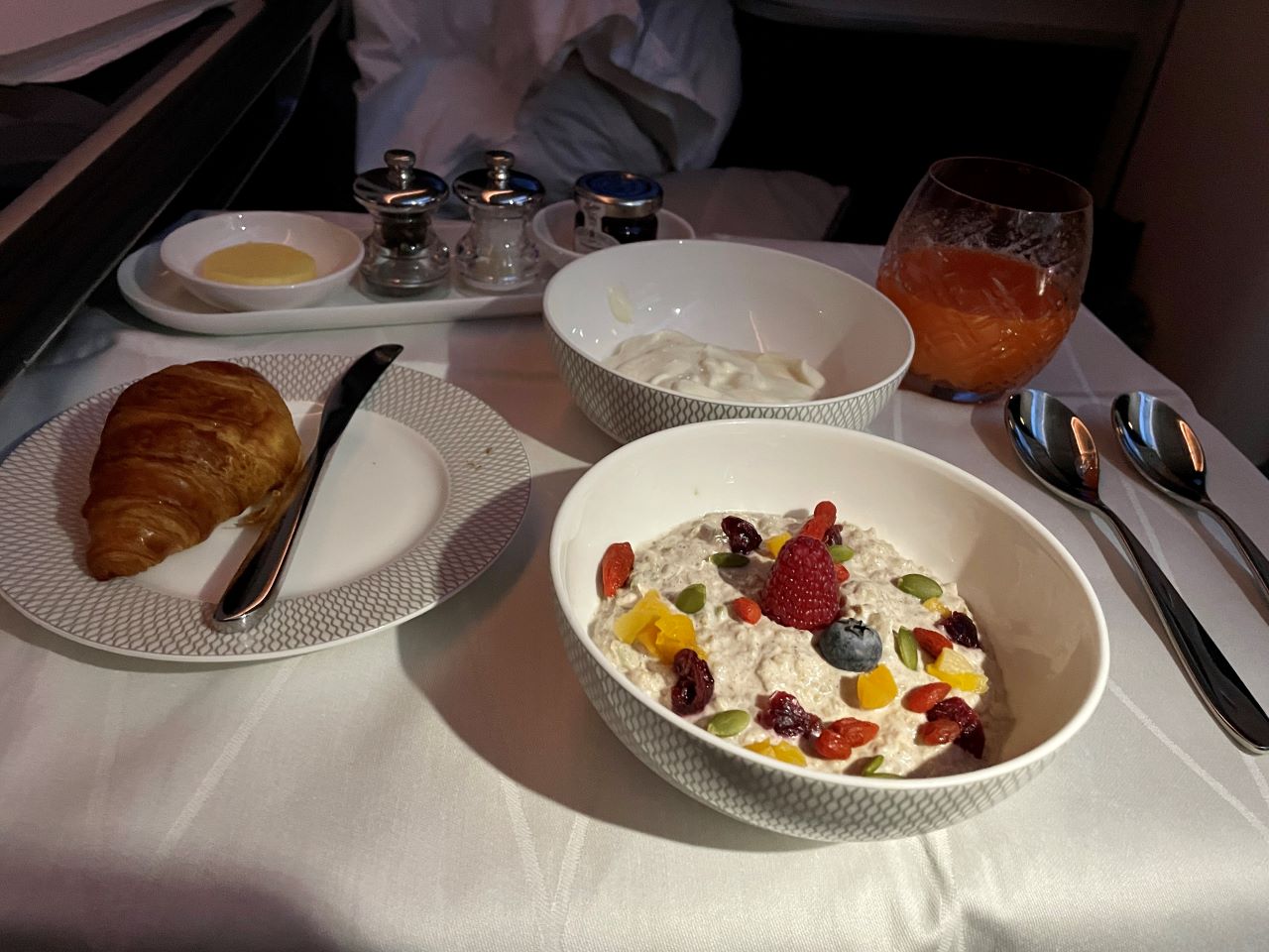 BA First Class Breakfast Meal - a pot of tea, with a smoothie, yoghurt, and quinoa granola