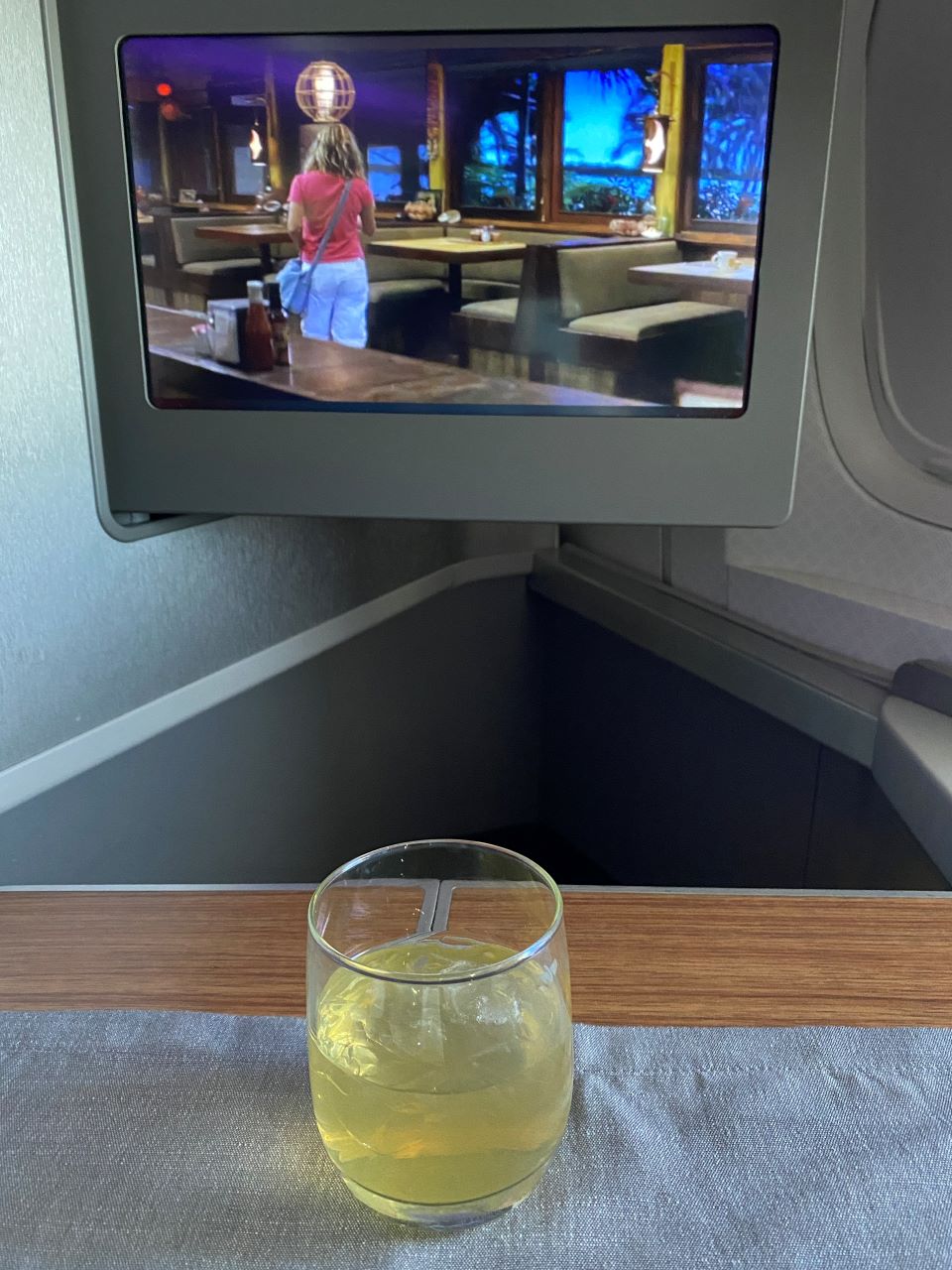 American Airlines business class IFE screen while drinking champagne