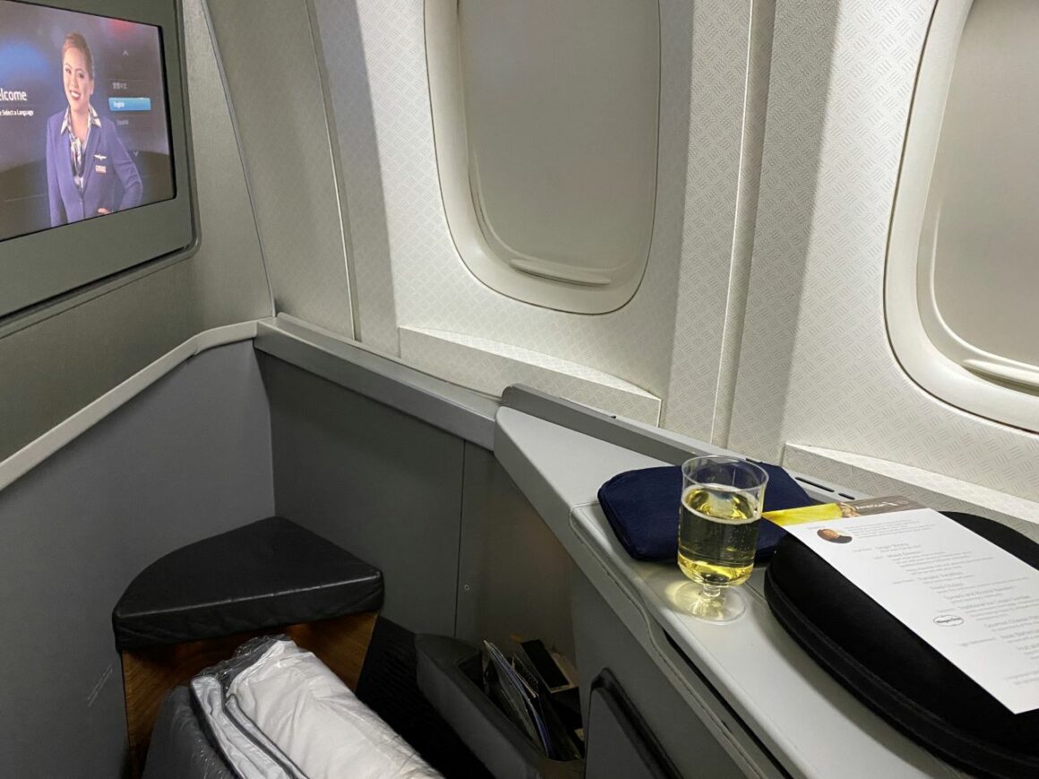 American Airlines business class champagne in window seat