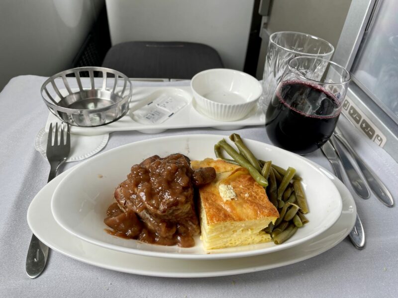 seared beef tenderloin, with a glass of Stellenbosch Cabernet Sauvignon in BA Club World 