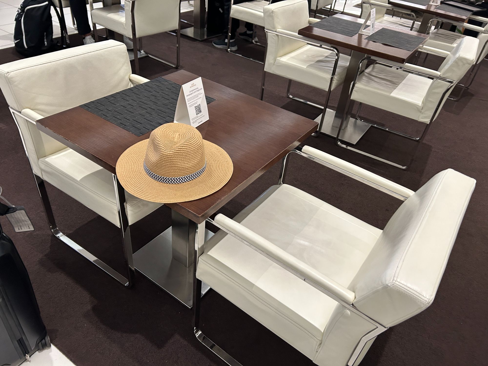 Table for Etihad business class lounge in Abu Dhabi Terminal 3 