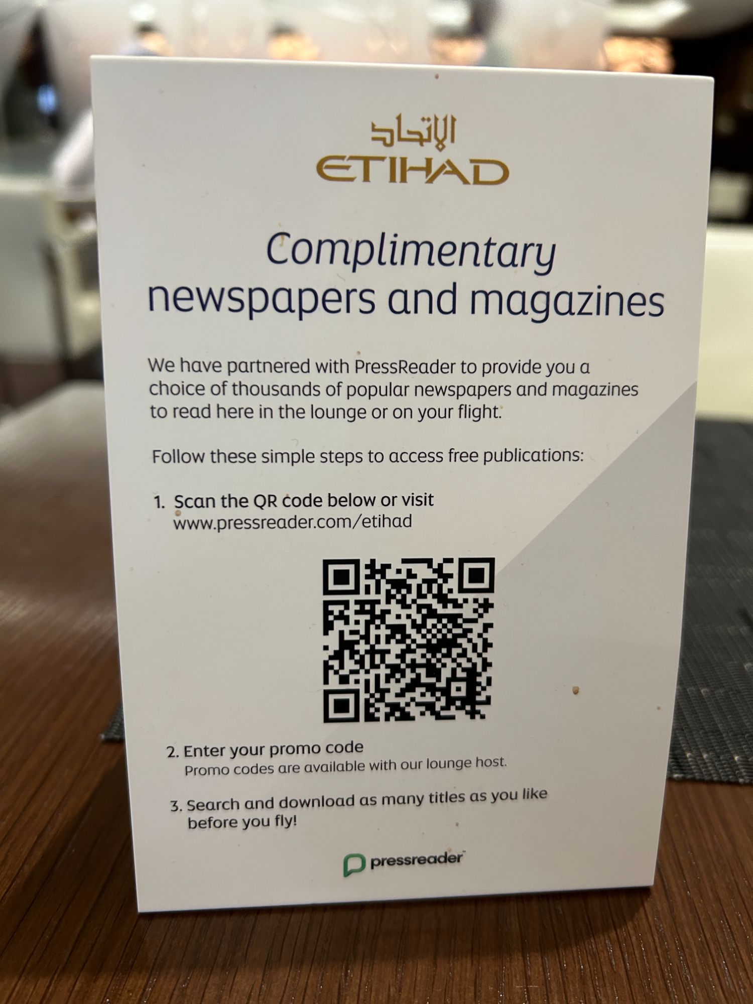 Etihad business class lounge complimentary newspapers and magazines