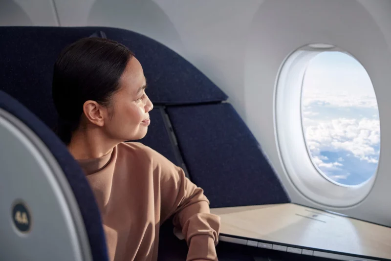 Finnair A350 business class woman looking out window