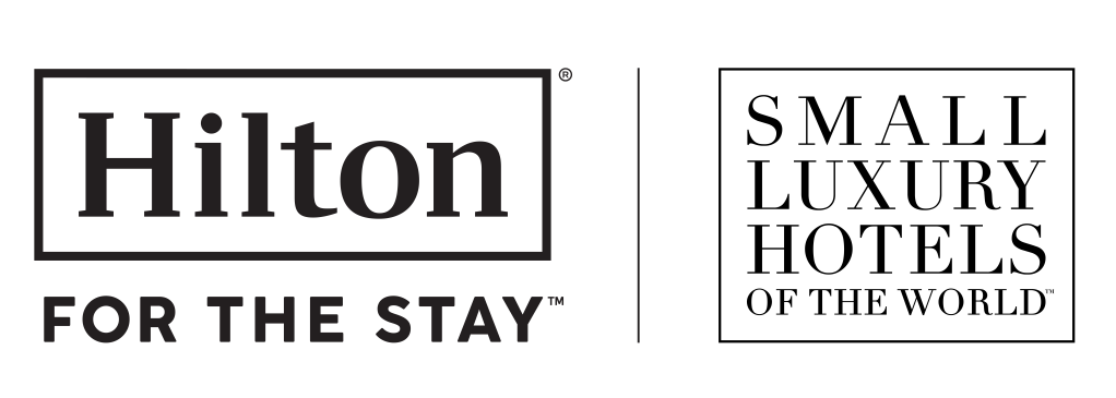 A Logo of Hilton and Small Luxury Hotels Partnership
